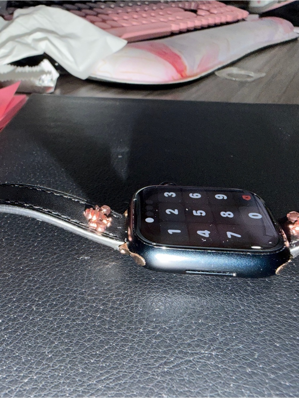 Apple Smartwatch with Black Case and Rose Gold Accents
